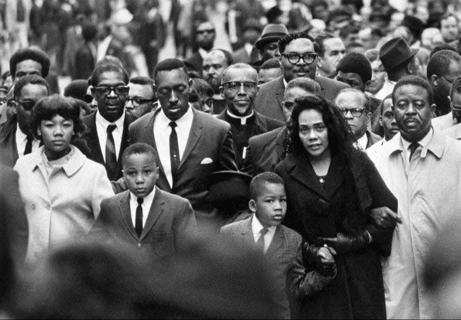 Dr. Martin Luther King Jr.'s widow, Coretta Scott King, leads a march through downtown Memphis in 1968 after he was fatally shot on April 4.