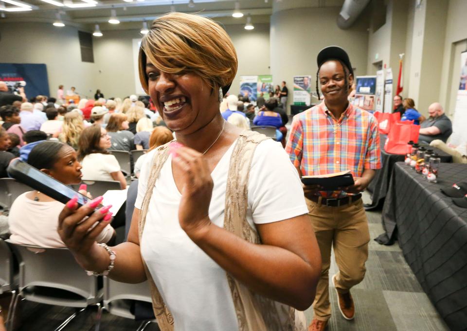 Lisa Miller reacts with delight for her son George Caddell Jr. after he signed with Premiere Service Company at Tuscaloosa Career and Technology Academy as local industries sign high school students to internships and jobs Wednesday, May 10, 2023, sponsored by West Alabama Works.