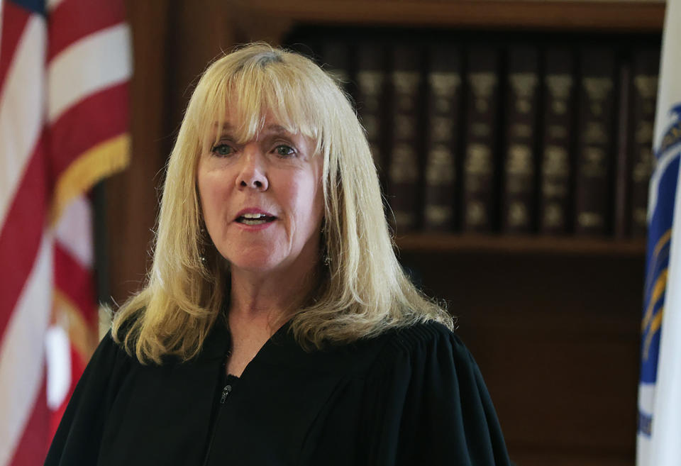 Judge Beverly J. Cannone addresses the jury before opening statements for the murder trial of Karen Read in Norfolk County Superior Court, Monday, Aapril 29, 2024, in Dedham, Mass. Read is accused of backing her SUV into her Boston Police officer boyfriend, John O'Keefe, and leaving him to die in a blizzard in Canton, in 2022. (Pat Greenhouse/The Boston Globe via AP, Pool)
