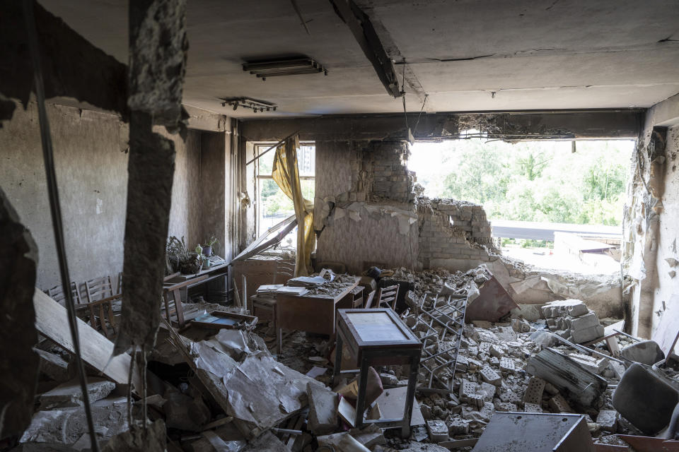 This photo shows the aftermath of a Russian air assault on a manufacturing plant where visually impaired people used to work until it was shuttered due to Russian attacks, in Kyiv, Ukraine, on May 30, 2023. Losing the place of work is just one of a multitude of challenges that people with visual impairments face across Ukraine since Russia launched a full-scale invasion in February 2022. (AP Photo/Roman Hrytsyna)