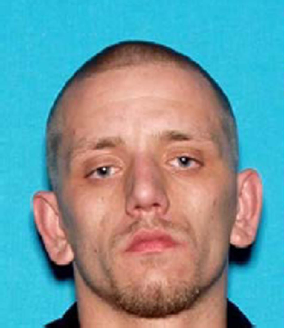 This image provided by the Napa Police department shows Ryan Scott Warner, who was detained at a San Francisco Bay Area commuter train station along with Sara Krueger Sunday Feb. 2, 2014 in the city of El Cerrito, Calif. The couple was wanted for questioning in the death of Krueger's 3-year-old daughter. (AP Photo/Napa Police Department)