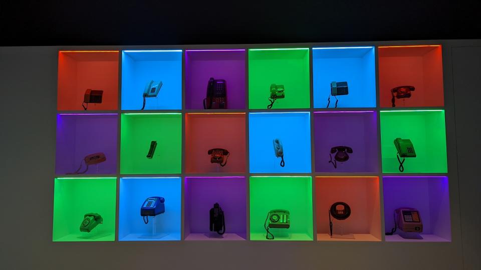 A picture of multiple vintage telephones in RGB backlit compartments at the National Museum of Singapore.(Photo: Yahoo Lifestyle Singapore)