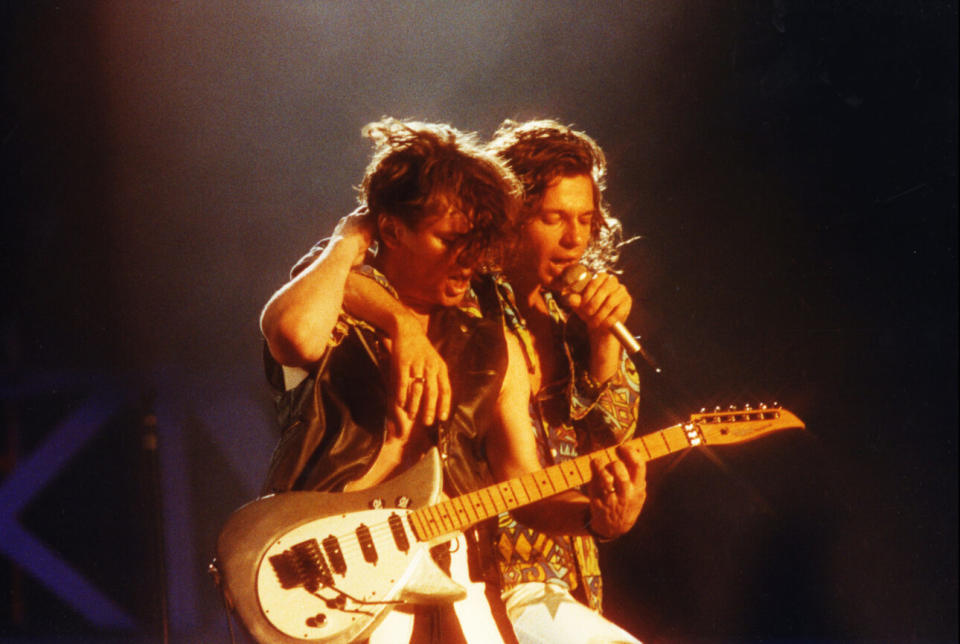 Farriss and Hutchence at Wembley Stadium on July 13th, 1991. (Credit: Pete Still/Redferns)