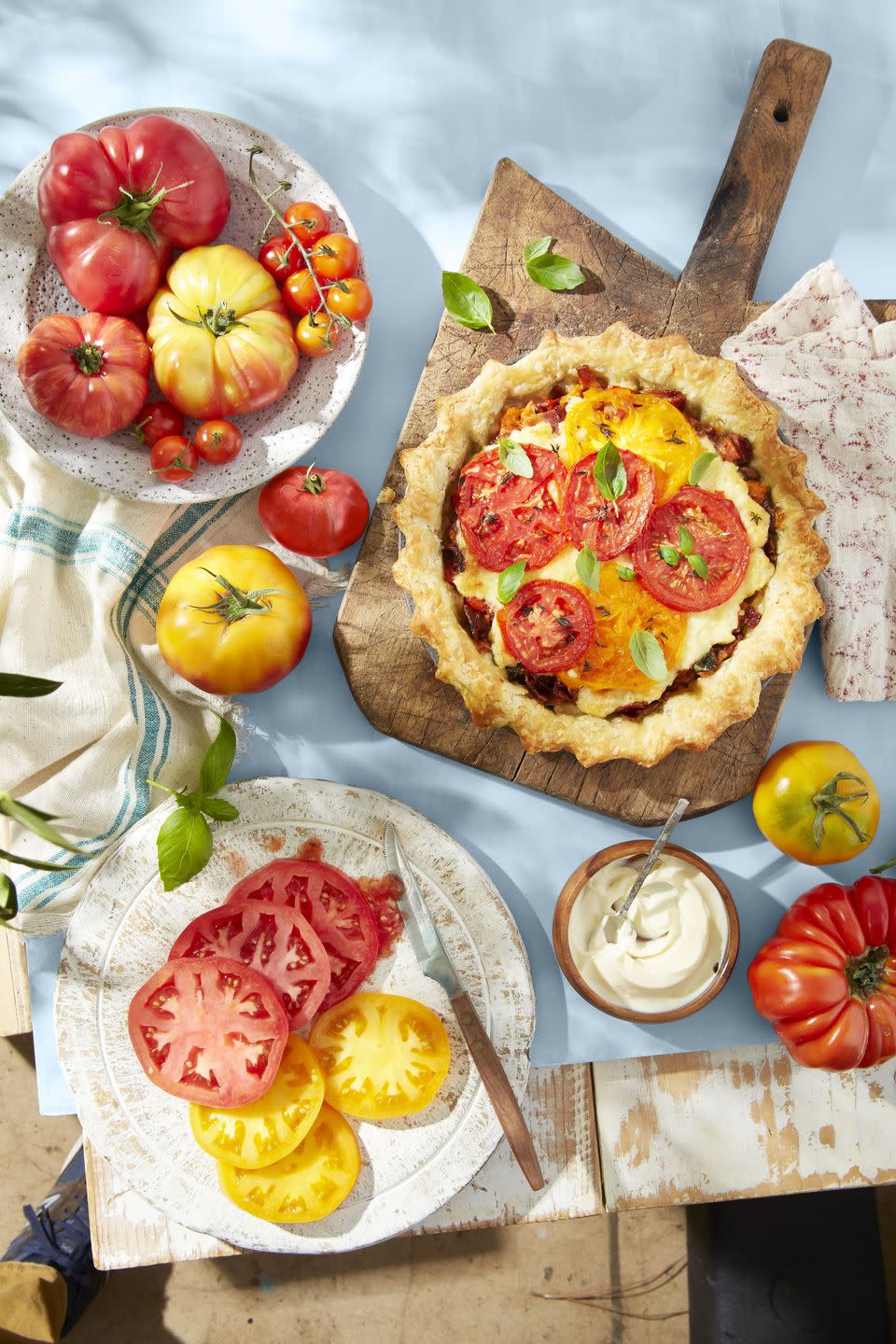 southern tomato pie with bacon on a wooden serving board