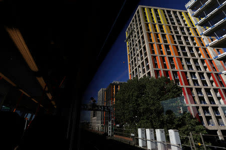 FILE PHOTO: An estate building cladded in colour panels is seen in London, Britain October 5, 2017. REUTERS/Afolabi Sotunde