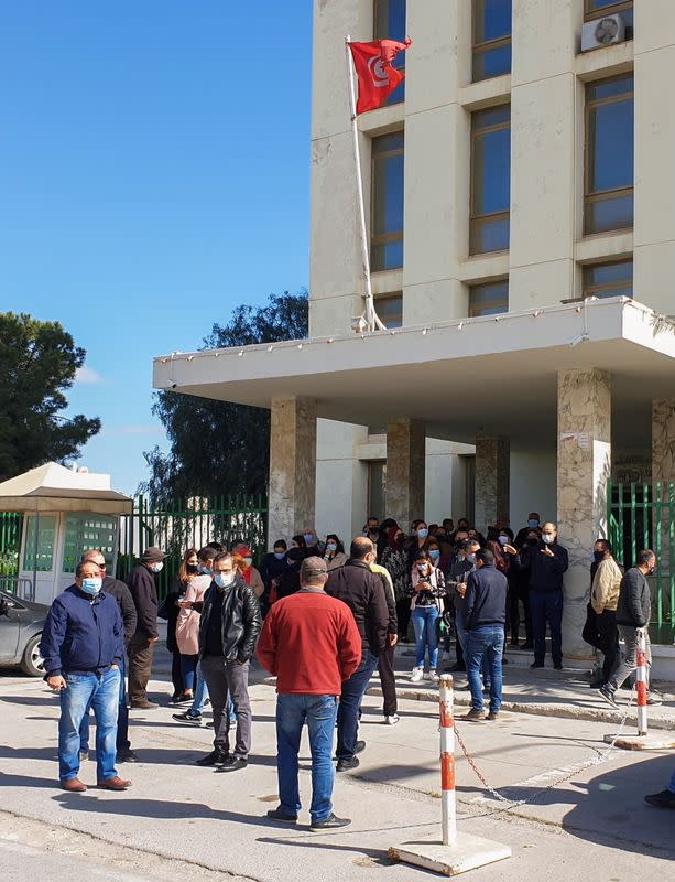 Journalists in Tunisia's state news agency gather as they protest against the appointment of a new CEO in Tunis