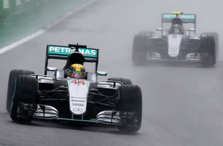 Formula One - F1 - Brazilian Grand Prix - Circuit of Interlagos, Sao Paulo, Brazil - 13/11/2016 - Mercedes' Lewis Hamilton of Britain (44) leads teammate Nico Rosberg of Germany (6). REUTERS/Nacho Doce