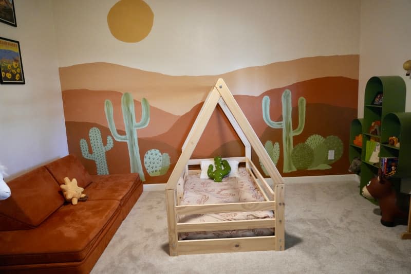 Toddler bed in desert themed guest bedroom.