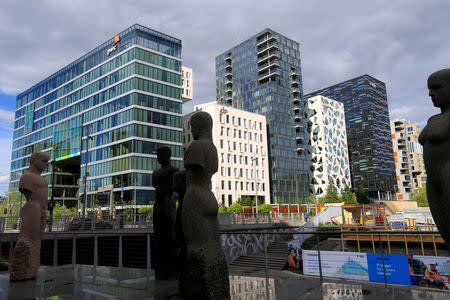 FILE PHOTO: Buildings are seen in the financial district in Oslo, Norway May 31, 2017. REUTERS/Ints Kalnins/File Photo