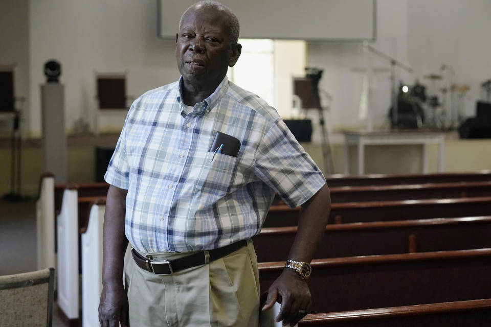 Senior Pastor Jean Bilbalo Joint, poses for a photo at the Haitian Baptist Church, Tuesday, Aug. 17, 2021, in Boynton Beach, Fla. Joint leads one of the many churches that are assisting their congregations as they deal with another tragedy shortly after the assassination of President Jovenel Moise. (AP Photo/Marta Lavandier)