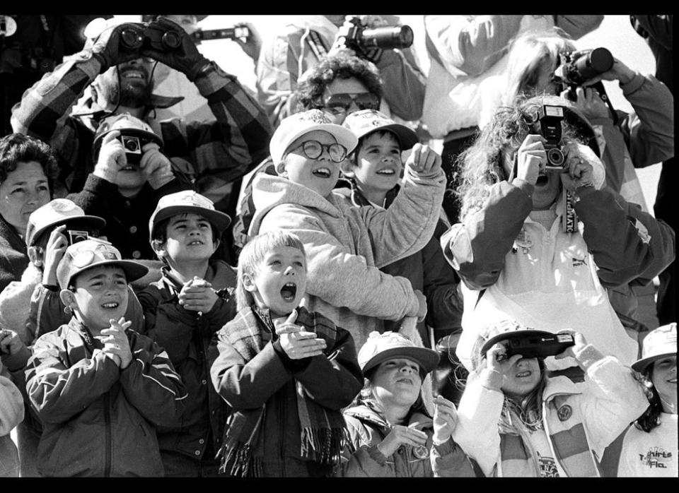 Classmates of the son of Christa McAuliffe, America's first schoolteacher to become an astronaut, cheer as the space shuttle Challenger lifts skyward from Cape Canaveral. Their delight soon turned to horror as the entire crew of seven was lost in the explosion 73 seconds into the flight. AP/Jim Cole (<a href="http://www.boston.com/bigpicture/2011/01/challenger_disaster_25_years_l.html" target="_hplink">Via the Big Picture</a>)