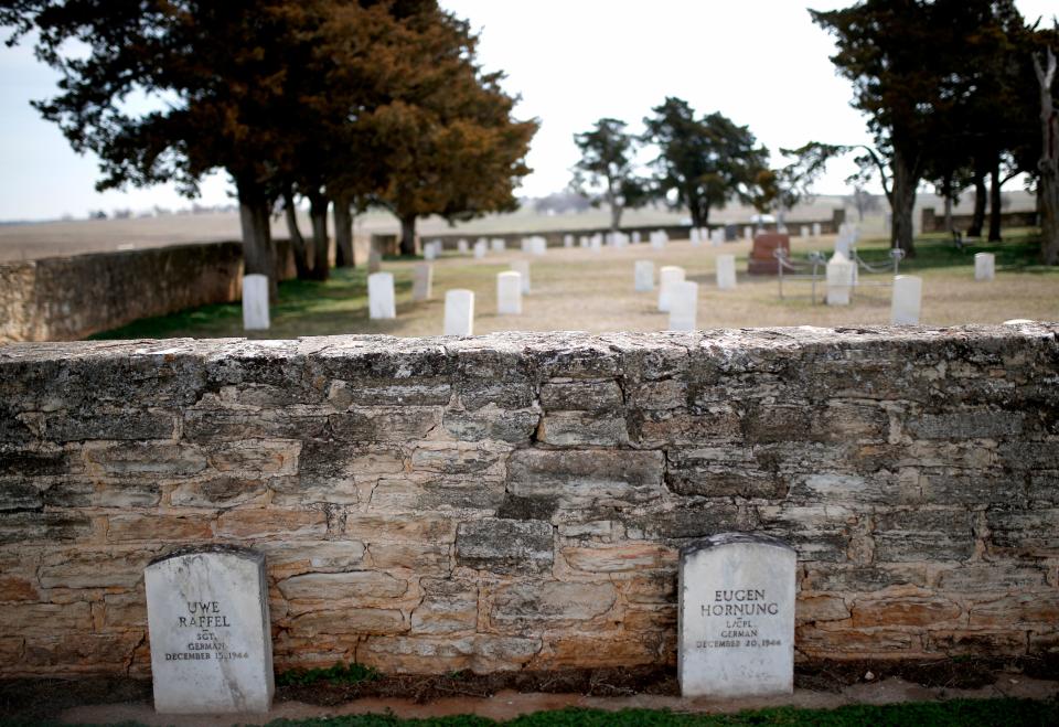 White markers at Fort Reno Cemetery in El Reno signify the final resting place for numerous World War II German prisoners of war.