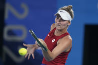 Marketa Vondrousova, of the Czech Republic, plays Elina Svitolina, of the Ukraine, during the semifinals of the tennis competition at the 2020 Summer Olympics, Thursday, July 29, 2021, in Tokyo, Japan. (AP Photo/Seth Wenig)