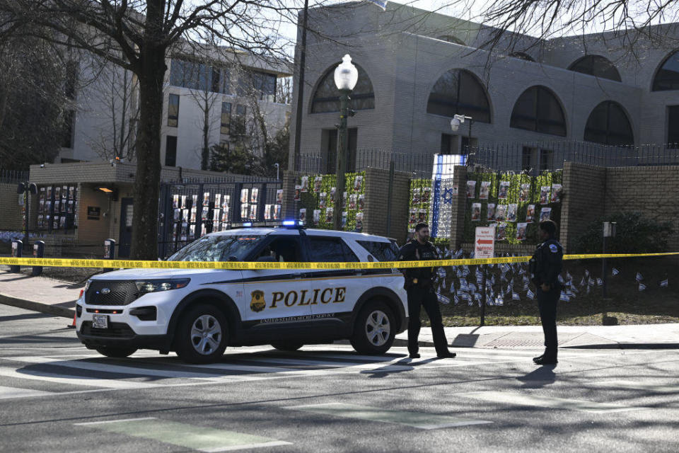 Police investigate the crime scene after a man set himself on fire in front of the Israeli Embassy in Washington, D.C., on Feb. 25, 2024. / Credit: Celal Gunes/Anadolu via Getty Images