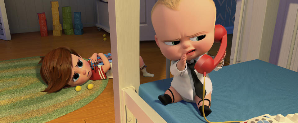 This image released by DreamWorks Animation shows characters Tim, voiced by Miles Bakshi, and Boss Baby, voiced by Alec Baldwin in a scene from the animated film, "The Boss Baby." (DreamWorks Animation via AP)