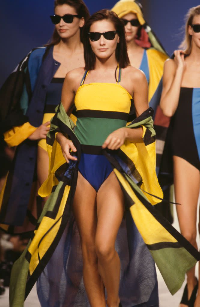 <p>Carla Bruni and other models wear color-blocked maillots at Jean-Charles de Castelbajac's spring 1987 fashion show. </p>