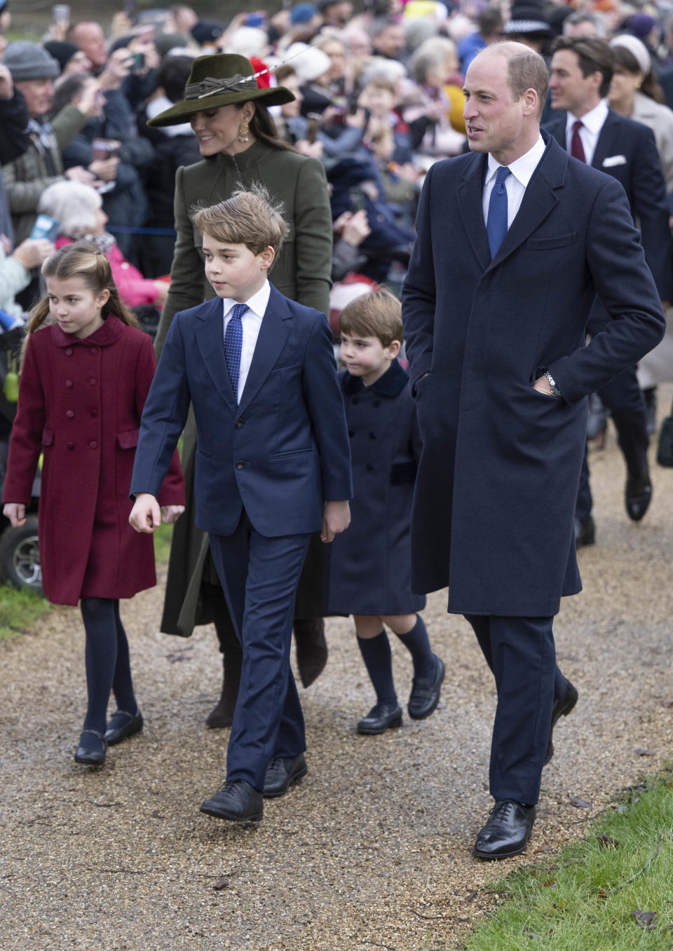 SANDRINGHAM, NORFOLK - DECEMBER 25: Prince William, Prince of Wales and Catherine, Princess of Wales with Prince George of Wales, Princess Charlotte of Wales and Prince Louis of Wales attend the Christmas Day service at St Mary Magdalene Church on December 25, 2022 in Sandringham, Norfolk. King Charles III ascended to the throne on September 8, 2022, with his coronation set for May 6, 2023. (Photo by UK Press Pool/UK Press via Getty Images)