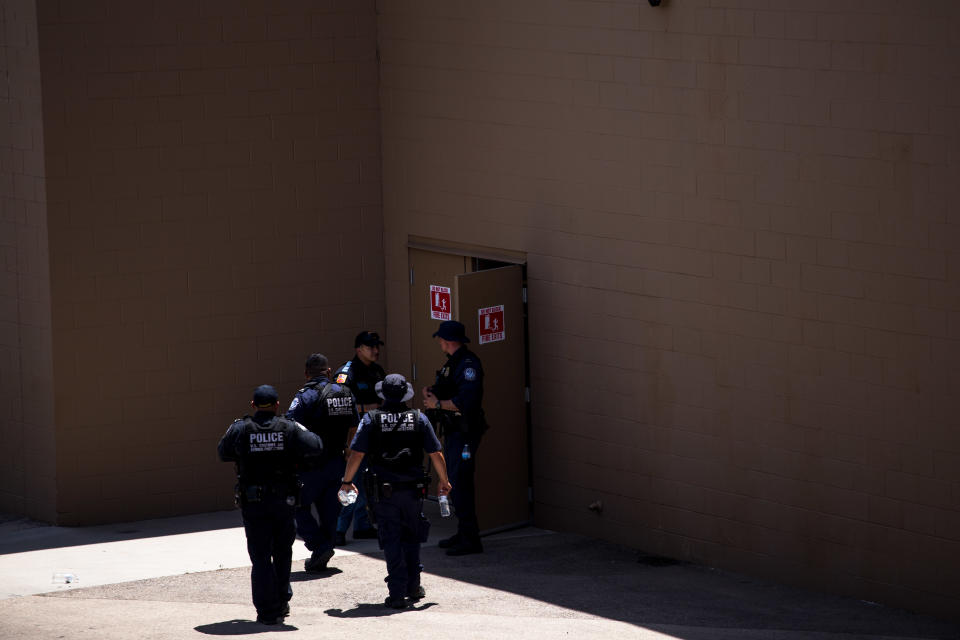Law enforcement agencies cover the exits of a Wal-Mart where a shooting occurred near Cielo Vista Mall in El Paso, Texas, on August 3, 2019.  (Photo: Joel Angel Juarez/AFP/Getty Images)