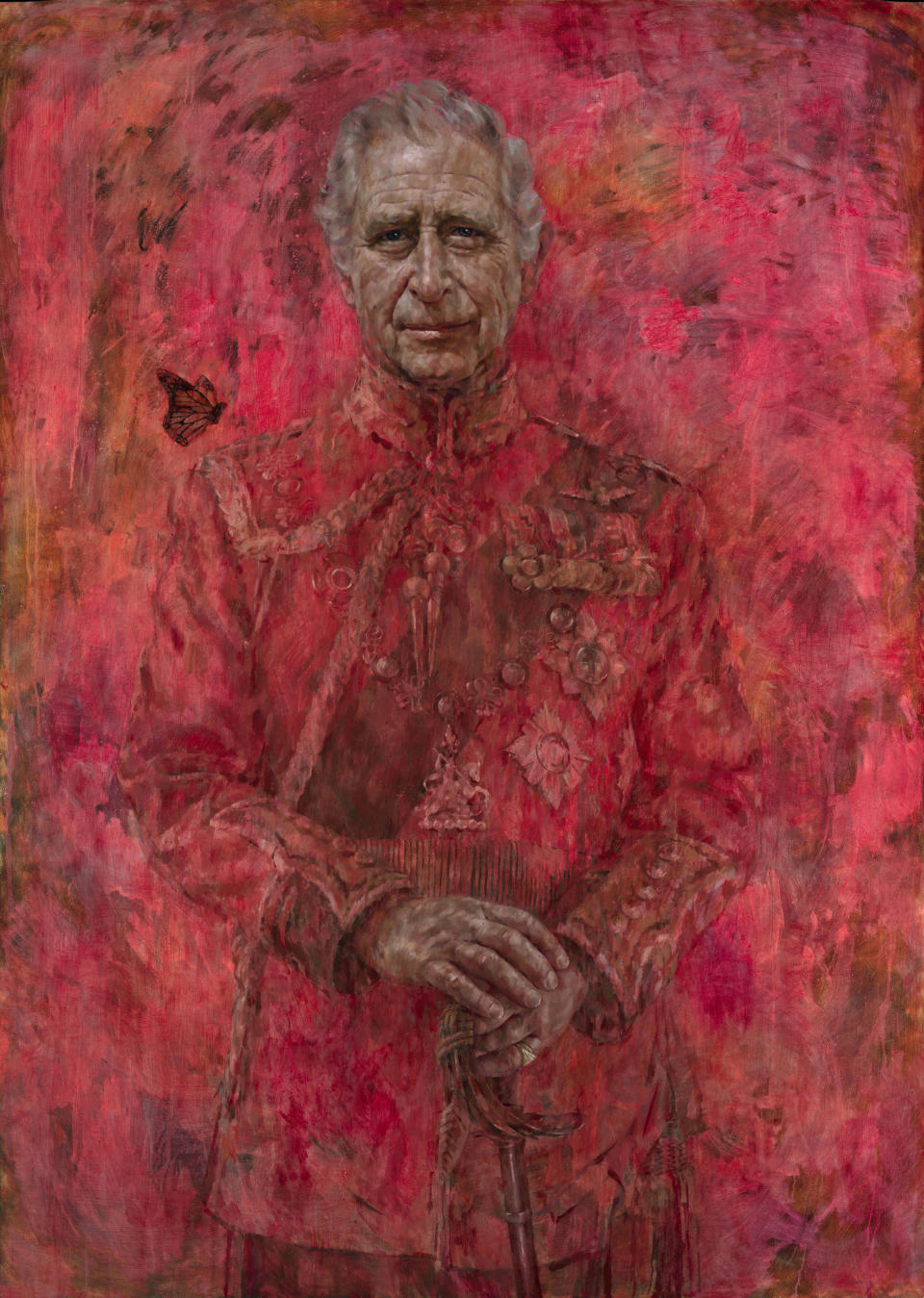This undated photo issued on Tuesday May 14, 2024 by Buckingham Palace of artist Jonathan Yeo's oil on canvas portrait of Britain's King Charles III. The portrait was commissioned in 2020 to celebrate the then Prince of Wales's 50 years as a member of The Drapers' Company in 2022. The artwork depicts the King wearing the uniform of the Welsh Guards, of which he was made Regimental Colonel in 1975. The canvas size - approximately 8.5 by 6.5 feet when framed - was carefully considered to fit within the architecture of Drapers' Hall and the context of the paintings it will eventually hang alongside. Jonathan Yeo had four sittings with the King, beginning when he was Prince of Wales in June 2021 at Highgrove, and later at Clarence House. The last sitting took place in November 2023 at Clarence House. Yeo also worked from drawings and photography he took, allowing him to work on the portrait in his London studio between sittings. (His Majesty King Charles III by Jonathan Yeo 2024 via PA)
