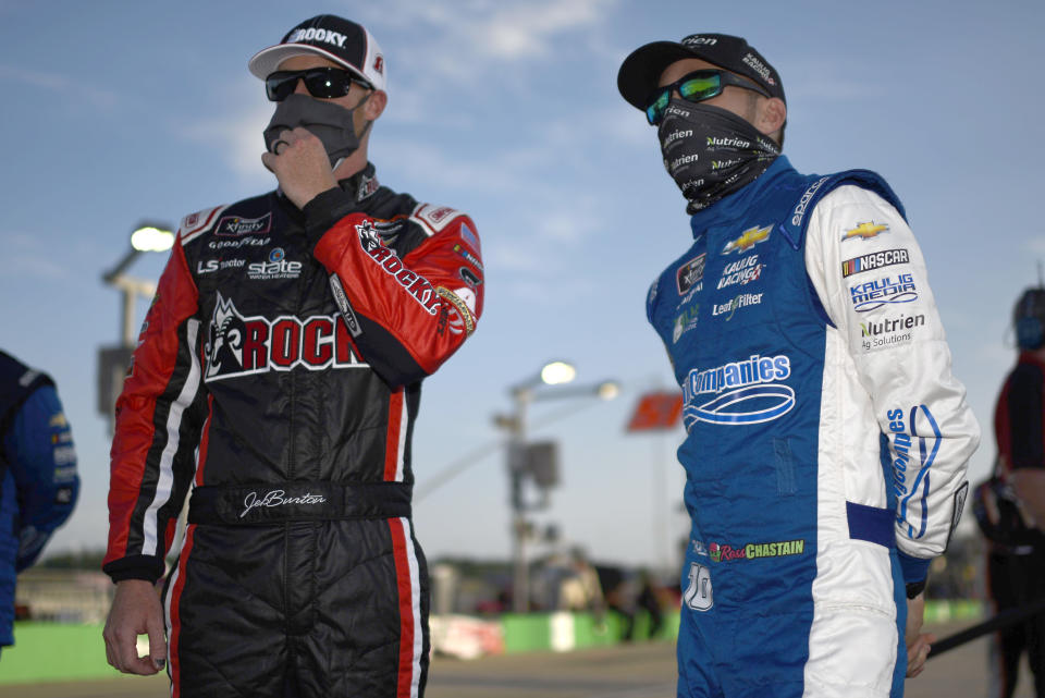 SPARTA, KENTUCKY - JULY 09: Jeb Burton, driver of the #8 Rocky Boots Chevrolet, and Ross Chastain, driver of the #10 Chevy Accessories Chevrolet, talk on the grid prior to the NASCAR Xfinity Series Shady Rays 200 at Kentucky Speedway on July 09, 2020 in Sparta, Kentucky. (Photo by Jared C. Tilton/Getty Images)