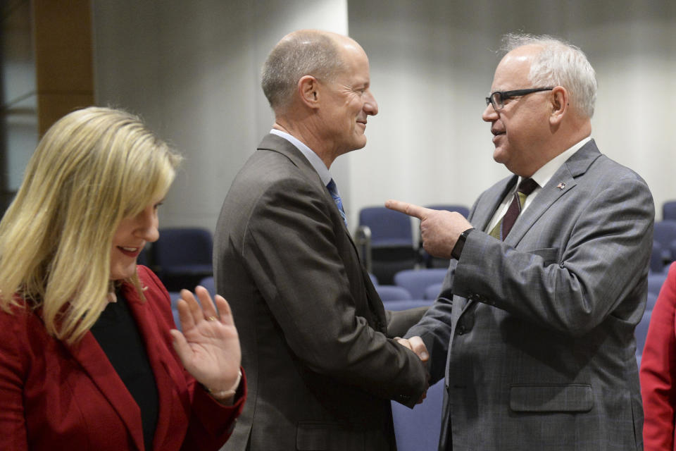 FILE - In this Feb. 5, 2020 file photo, House Speaker Melissa Hortman, from left, Senate Majority Leader Paul Gazelka, Gov. Tim Walz, House Assistant Deputy Minority Leader Anne Neu and Senate Minority Leader Susan Kent gather for a forum with media at the State Capitol in St. Paul, Minn. (Scott Takushi/Pioneer Press via AP, File)