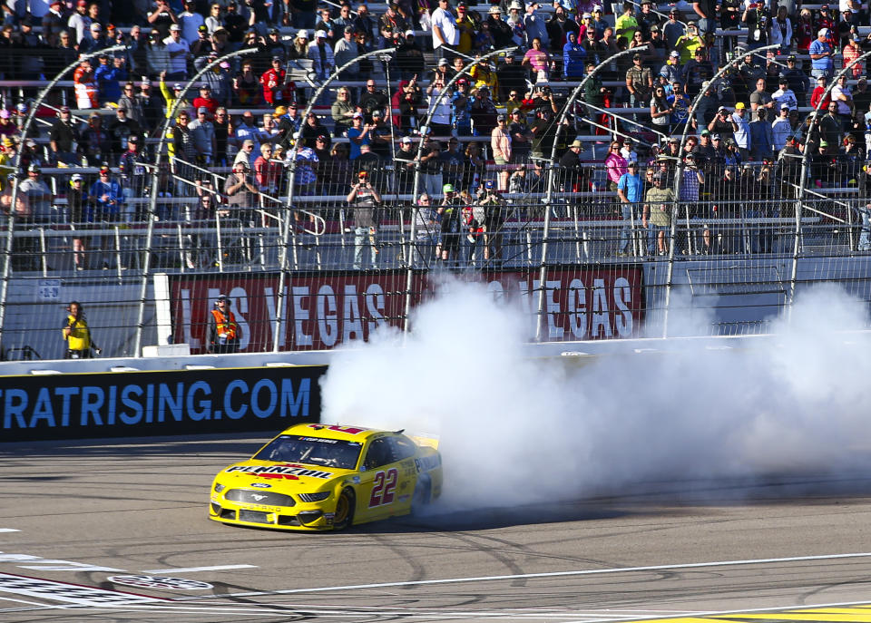 Joey Logano (22) does a burnout after winning a NASCAR Cup Series auto race at Las Vegas Motor Speedway on Sunday, Feb. 23, 2020. (AP Photo/Chase Stevens)