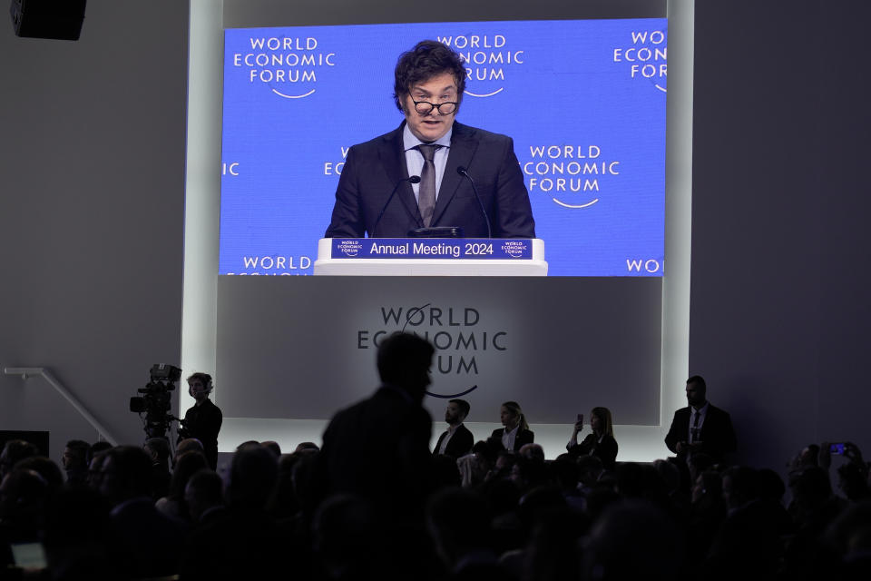 President of Argentina Javier Milei delivering his speech is broadcasted on a screen at the Annual Meeting of World Economic Forum in Davos, Switzerland, Wednesday, Jan. 17, 2024. The annual meeting of the World Economic Forum is taking place in Davos from Jan. 15 until Jan. 19, 2024.(AP Photo/Markus Schreiber)