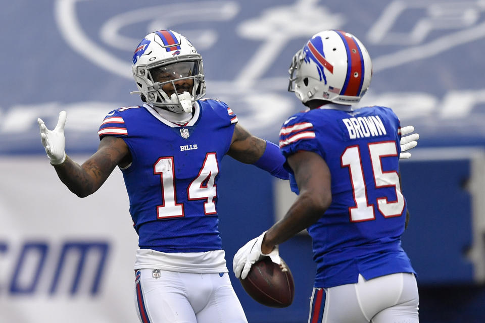 Buffalo Bills wide receiver John Brown (15) celebrates his touchdown with wide receiver Stefon Diggs (14) in the first half of an NFL football game against the Miami Dolphins, Sunday, Jan. 3, 2021, in Orchard Park, N.Y. (AP Photo/Adrian Kraus)