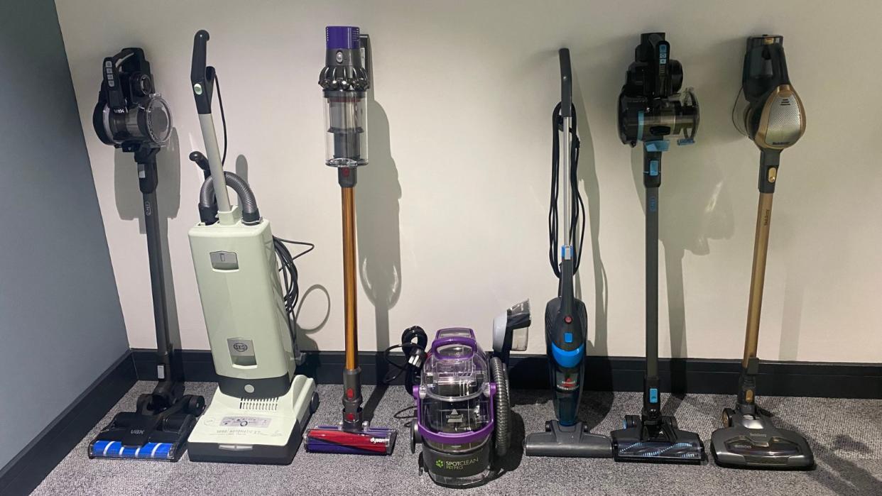  An example of how we test vacuums: a range of different tested vacuums all lined up in a row. 