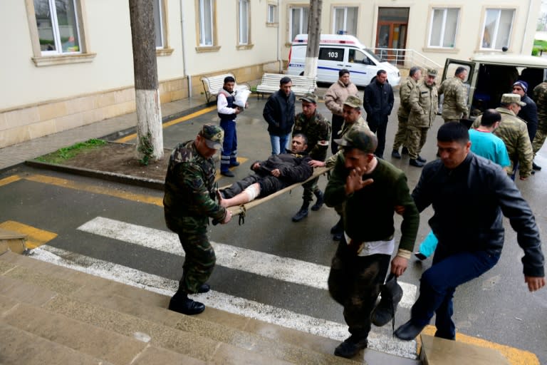 Azeri soldiers wounded in clashes in the Nagorny Karabakh are taken to hospital in the frontline town of Terter