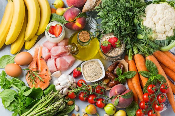 PHOTO: Assortment of healthy food ingredients for cooking on a kitchen table. (Aamulya/Getty Images/iStockphoto)