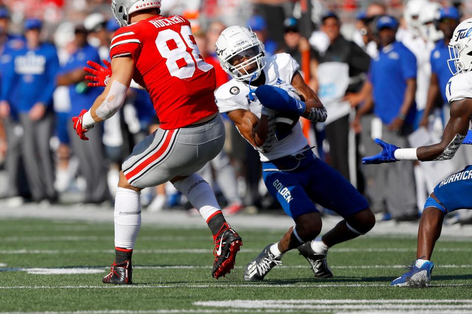 Tulsa cornerback Travon Fuller (2) intercepts a pass intended for Ohio State tight end Jeremy Ruckert (88) on Sept. 18 in Columbus, Ohio.