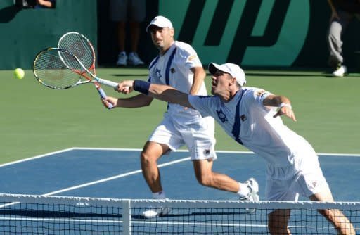 Israel's Jonathan Erlich (R) and his partner Andy Ram (L) try to return a shot during their doubles match against Japan's Tatsuma Ito and Yuichi Sugita in the Davis Cup World Group tennis play-off tie in Tokyo. The Israeli pair won the match 6-7, 6-3, 6-3, 6-1