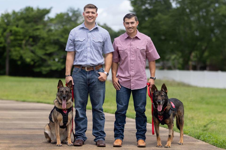 <p>Callynth Photography/American Humane</p> From left: Aida the German shepherd, Dalton Stone, Sgt. Isaac Weissend, and Poker the German shepherd