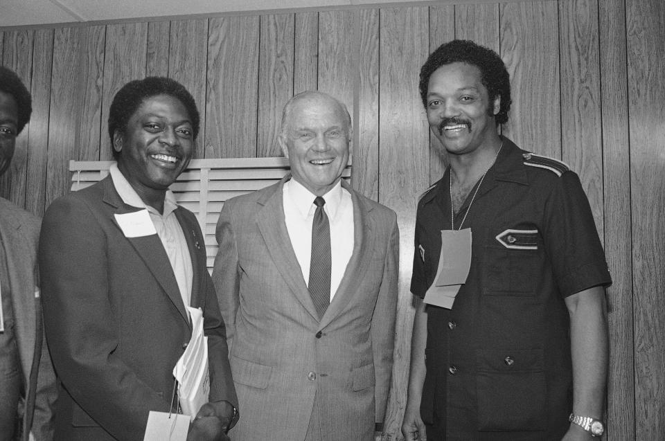 Rep. Jim Clyburn, left, meets in 1982 with John Glenn, center, and Jesse Jackson, both of whom would seek the Democratic Party’s presidential nomination two years later.