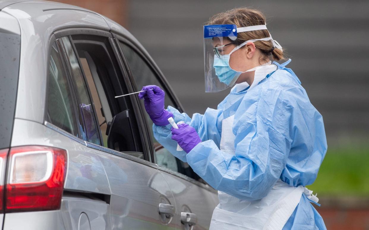 NHS staff carry out Coronavirus tests at a testing facility in Bracebridge Heath, Lincoln - PA