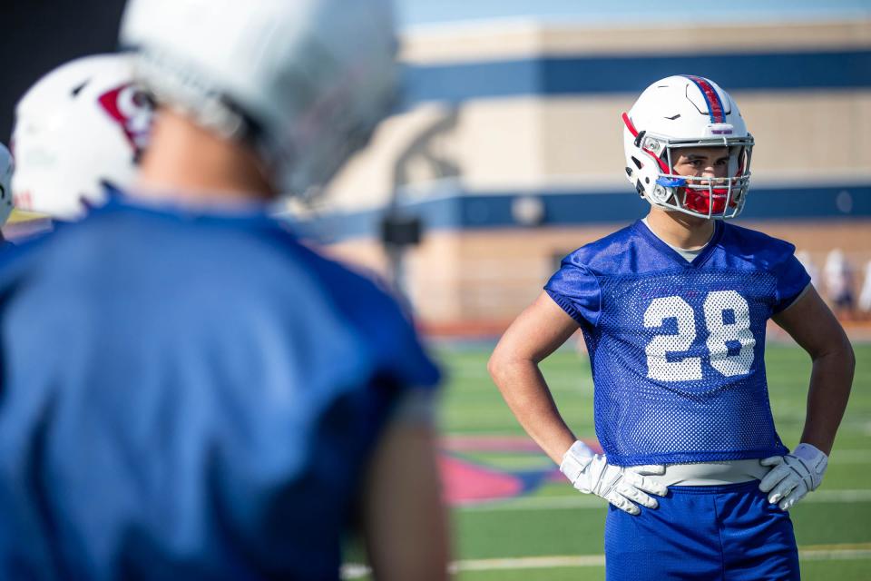 Gregory-Portland's Gabriel Juarez listens to coaching during practice on Aug. 9, 2022, at Ray Akins Wildcat Stadium in Portland, Texas.