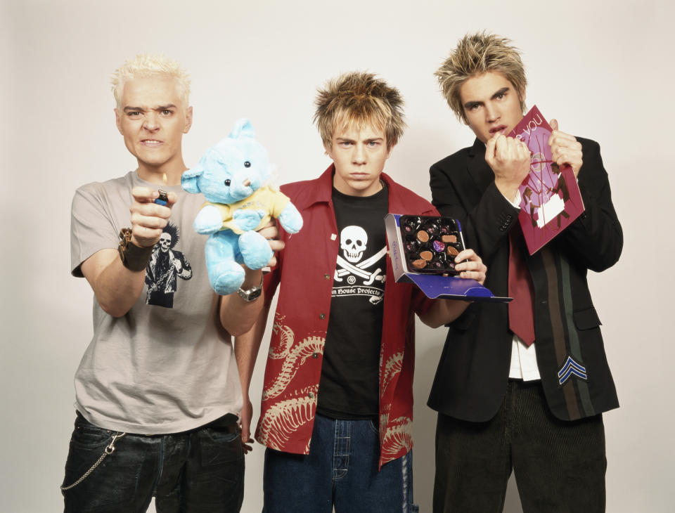 British pop group Busted, circa 2003. Left to right: Matt Willis, James Bourne and Charlie Simpson. (Photo by Tim Roney/Getty Images)