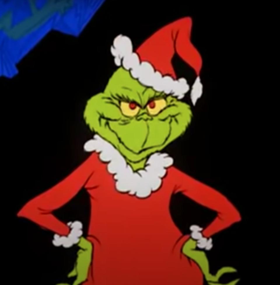 The Grinch dressed as Santa Claus in "Dr Seuss' How the Grinch Stole Christmas!"
