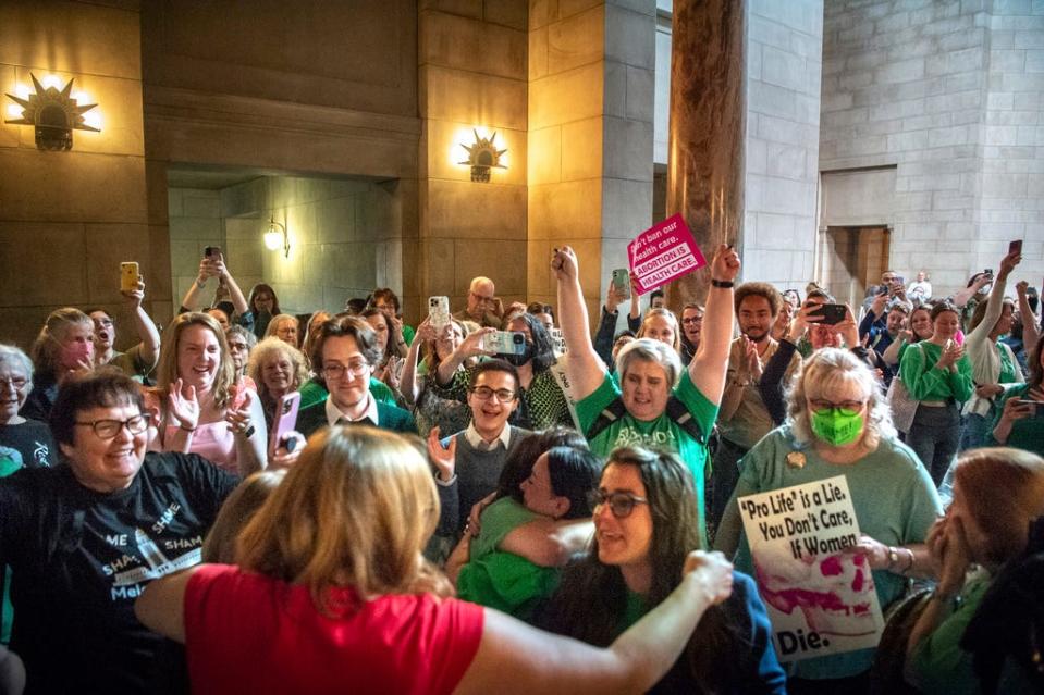Opponents of LB626 celebrate in the Rotunda after the bill fails to advance after failing one vote short of cloture, Thursday, April 27, 2023, at the Nebraska State Capital in Lincoln, Neb. The bill sought to ban abortions in Nebraska after about 6 six weeks.