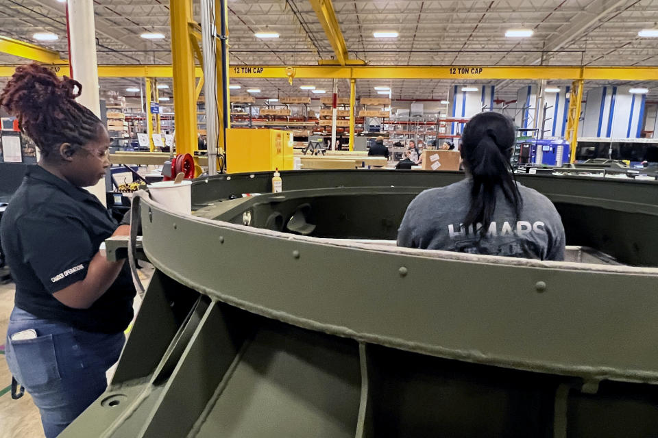 The base of an M270 Multiple Launch Rocket System (MLRS) is assembled at Lockheed Martin's weapons plant, Thursday, March 14, 2024 in Camden, Ark. (AP Photo/Tara Copp)