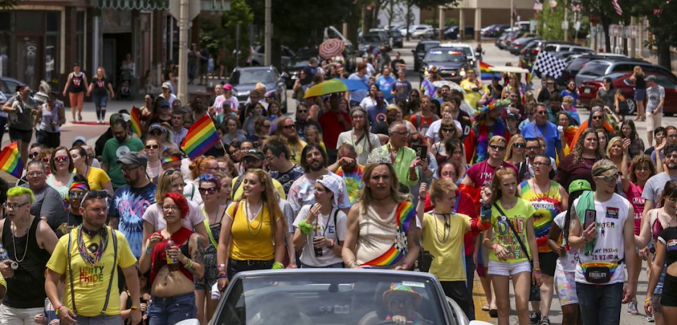 A gay pride march shown in the “Our Story: Pride in Memory” film teaser.
