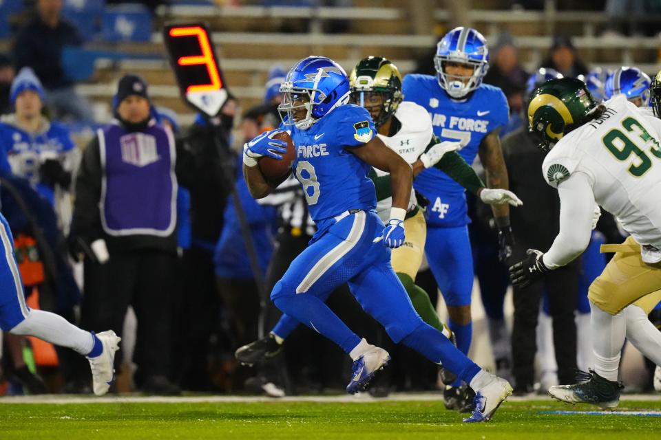 Air Force's wideouts, like DeAndre Hughes, worry more about carries than receptions. God Bless triple-option football.