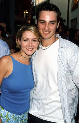 <p>Ron Galella/Ron Galella Collection via Getty </p> Ali Hillis and Kerr Smith