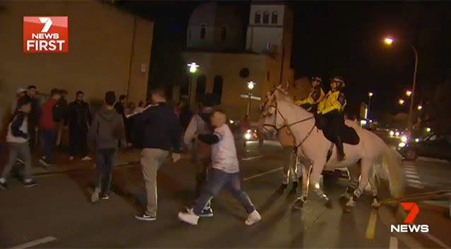 Mounted police were called to disperse the crowds. Source: 7 News