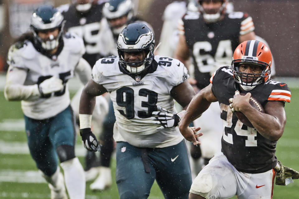 Cleveland Browns running back Nick Chubb (24) rushes during the second half of an NFL football game against the Philadelphia Eagles, Sunday, Nov. 22, 2020, in Cleveland. (AP Photo/Ron Schwane)