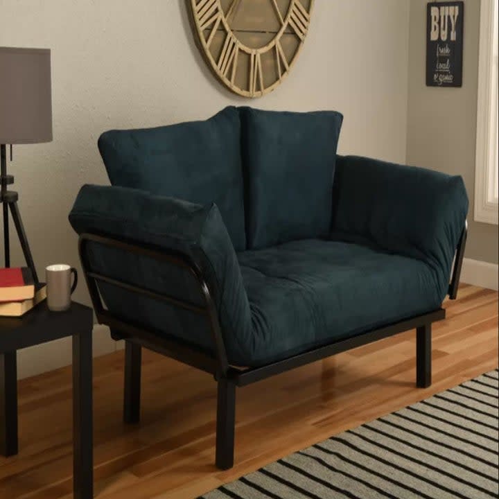 velvet futon style sofa on metal base