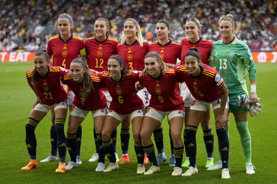 Spain players pose before the Women Euro 2022 group B soccer match between Germany and Spain at Brentford Community Stadium in London, England, Tuesday, July 12, 2022. (AP Photo/Alessandra Tarantino)