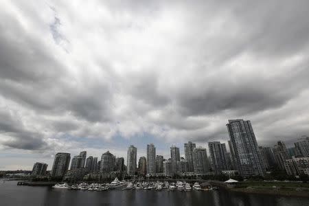 Residential and commercial buildings are pictured in Vancouver, British Columbia June 20, 2011. REUTERS/Jason Lee