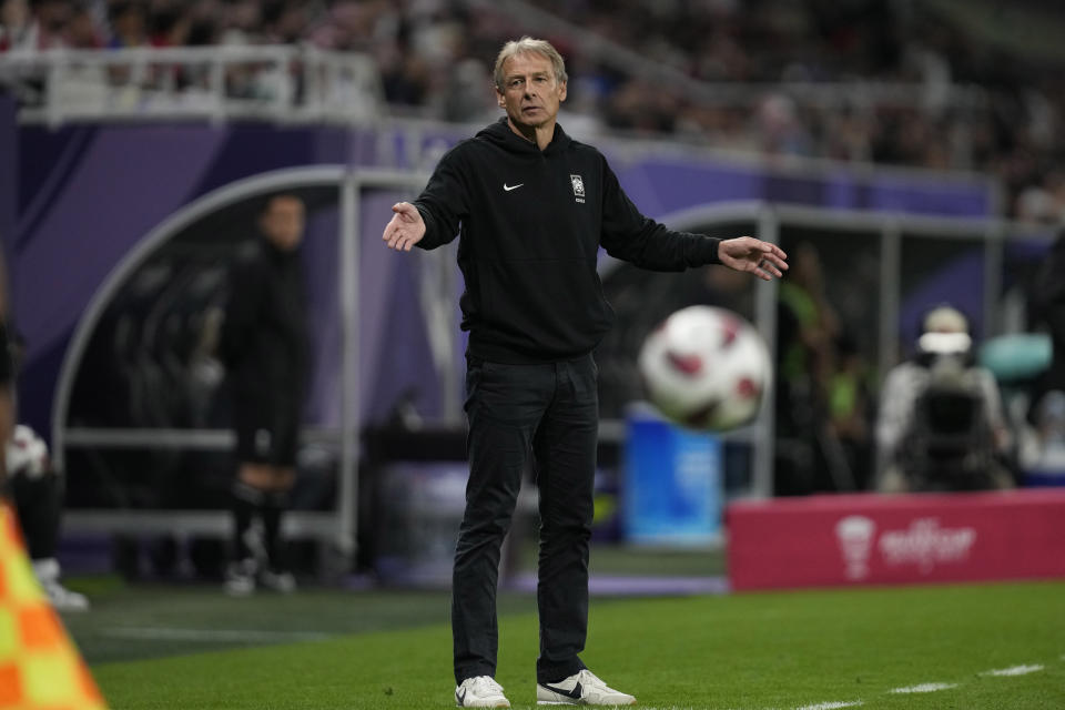 South Korea's head coach Jurgen Klinsmann reacts during the semi-final soccer match between Jordan and South Korea at Ahmad Bin Ali Stadium in Al Rayyan, Qatar, Tuesday, Feb. 6, 2024. (AP Photo/Thanassis Stavrakis)